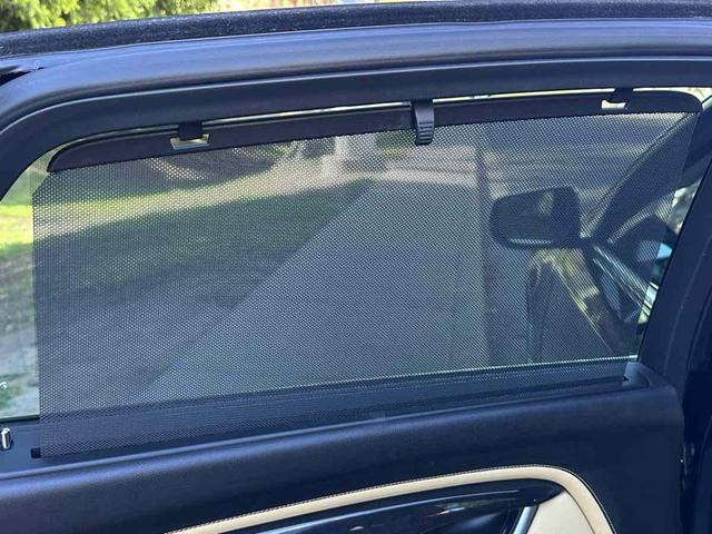 Photo of 2014 Black Raven Cadillac XTS