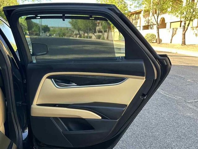 Photo of 2014 Black Raven Cadillac XTS
