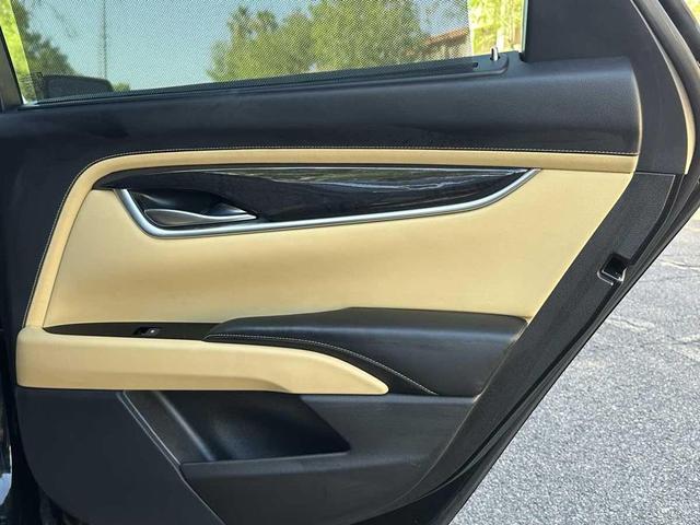 Photo of 2014 Black Raven Cadillac XTS