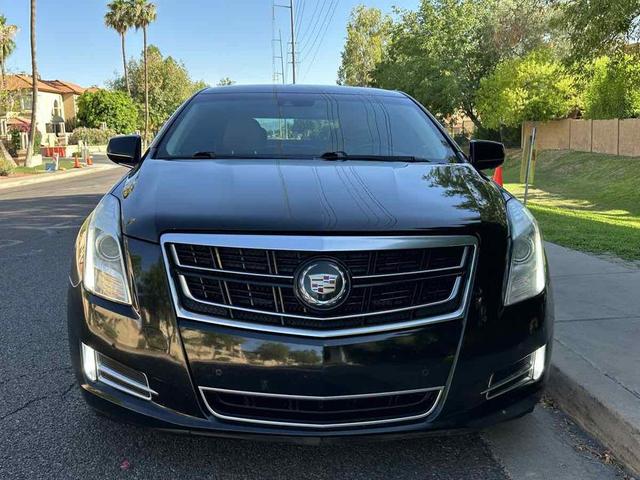 Photo of 2014 Black Raven Cadillac XTS