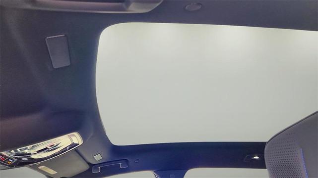 Photo of 2025 Flare Metallic Cadillac Escalade IQ