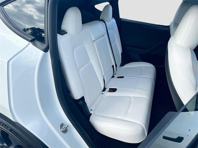 Photo of 2024 Pearl White Multi-Coat Tesla Model Y