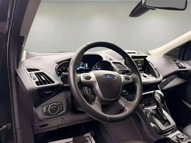 Photo of 2015 Tuxedo Black Ford Escape