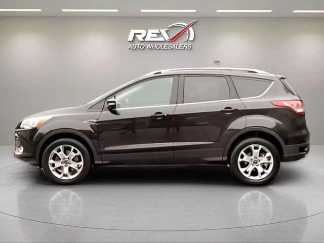 Photo of 2015 Tuxedo Black Ford Escape