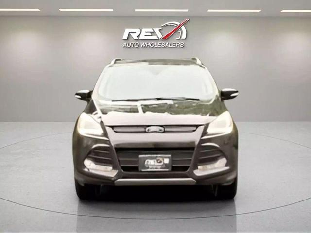 Photo of 2015 Tuxedo Black Ford Escape