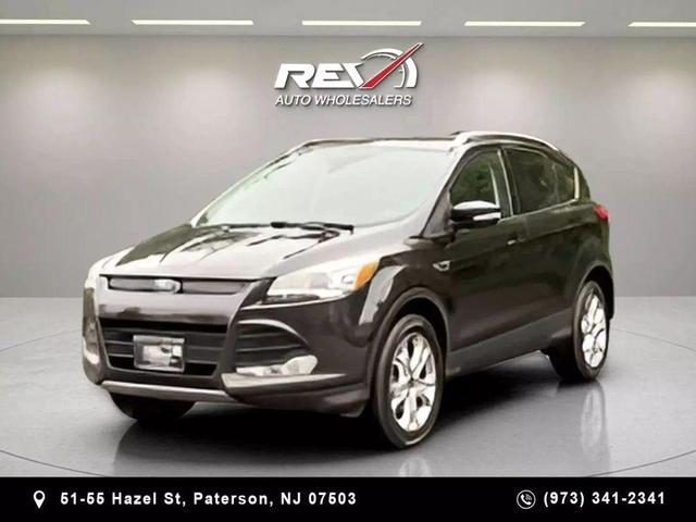 Photo of 2015 Tuxedo Black Ford Escape