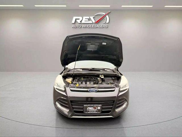 Photo of 2015 Tuxedo Black Ford Escape