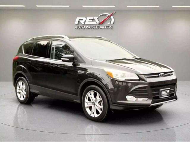 Photo of 2015 Tuxedo Black Ford Escape