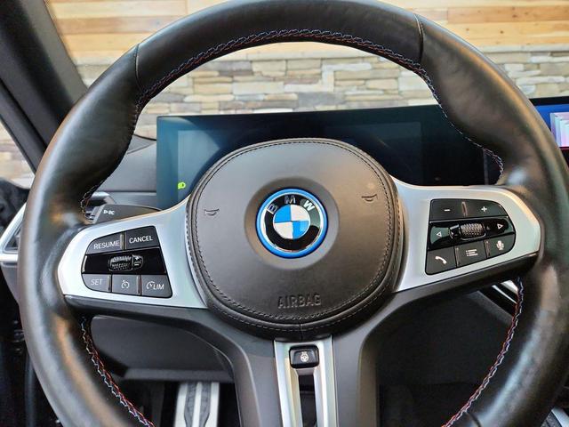 Photo of 2024 Black Sapphire Metallic BMW i4 Gran Coupe