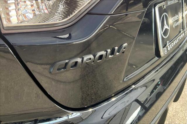 Photo of 2023 Midnight Black Metallic Toyota Corolla