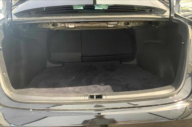 Photo of 2023 Midnight Black Metallic Toyota Corolla