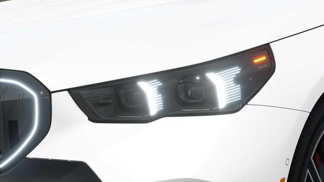 Photo of 2026 Mineral White Metallic BMW 540