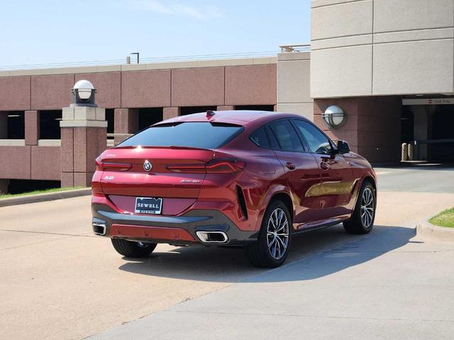 Photo of 2023 Flamenco Red Metallic BMW X6