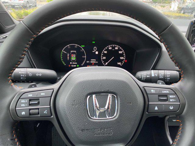 Photo of 2025 Radiant Red Metallic Honda CR-V Hybrid