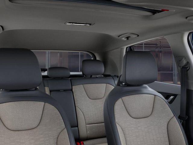 Photo of 2025 Mineral Blue Kia Niro
