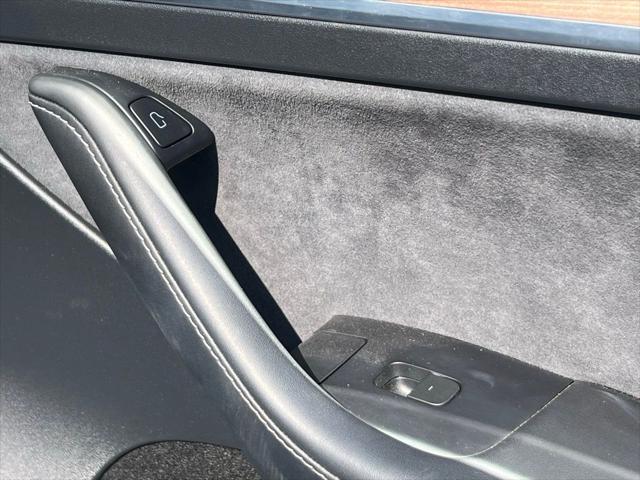 Photo of 2024 Pearl White Multi-Coat Tesla Model Y