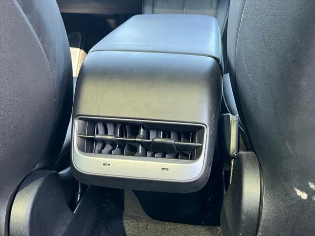 Photo of 2024 Pearl White Multi-Coat Tesla Model Y