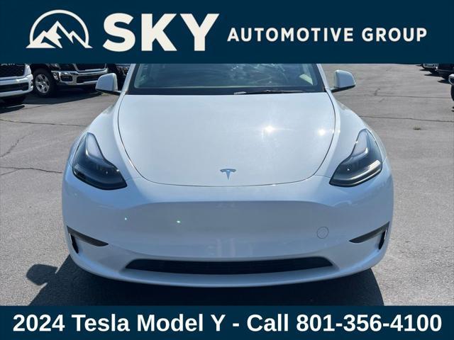 Photo of 2024 Pearl White Multi-Coat Tesla Model Y
