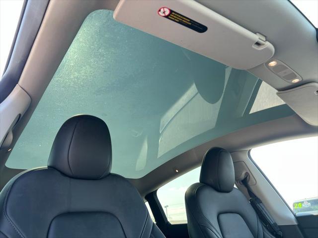 Photo of 2024 Pearl White Multi-Coat Tesla Model Y