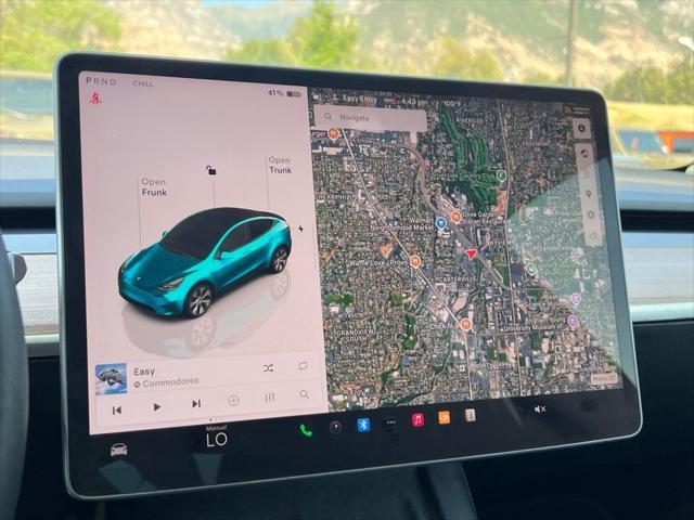 Photo of 2024 Pearl White Multi-Coat Tesla Model Y