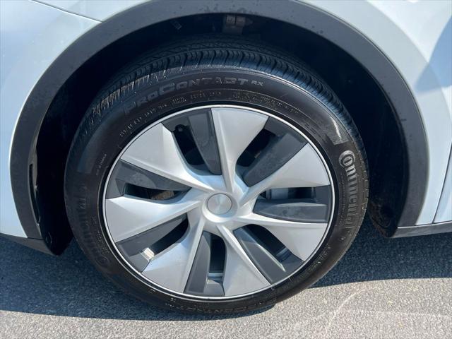 Photo of 2024 Pearl White Multi-Coat Tesla Model Y