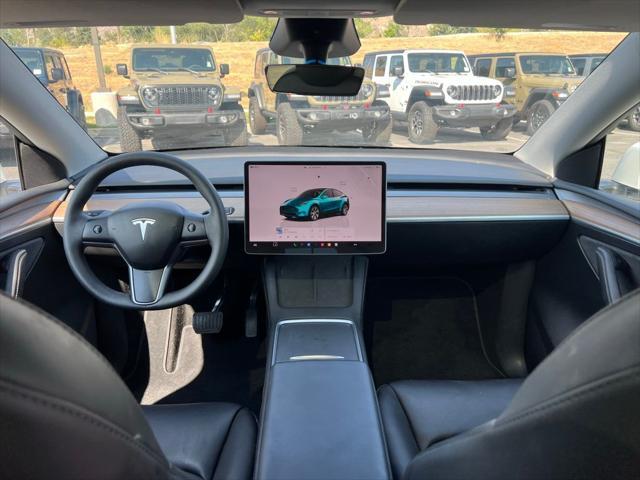 Photo of 2024 Pearl White Multi-Coat Tesla Model Y