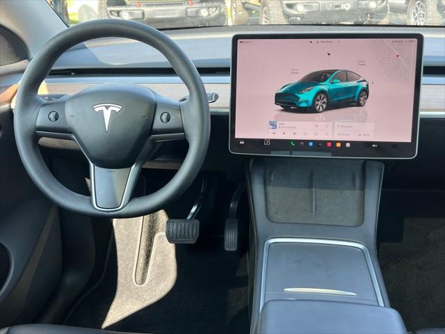 Photo of 2024 Pearl White Multi-Coat Tesla Model Y