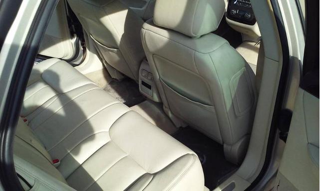 Photo of 2009 Gold Cadillac DTS