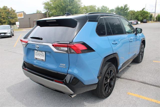 Photo of 2024 Cavalry Blue/Midnight Black Metallic Toyota RAV4 Hybrid