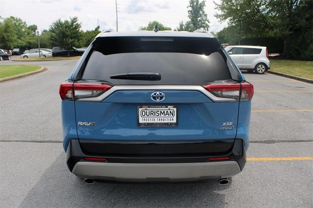 Photo of 2024 Cavalry Blue/Midnight Black Metallic Toyota RAV4 Hybrid