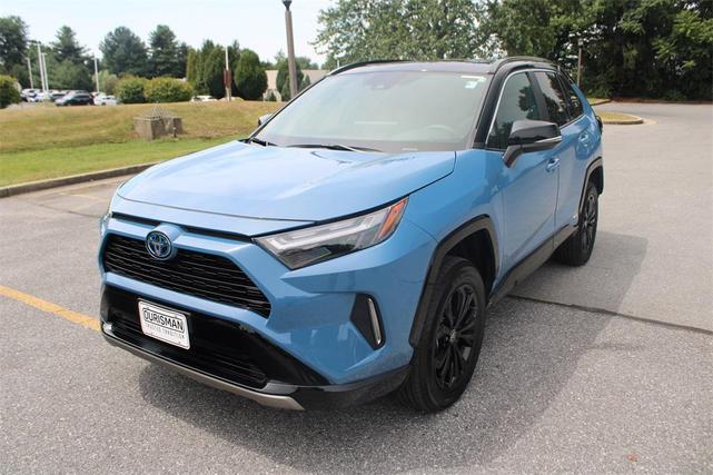 Photo of 2024 Cavalry Blue/Midnight Black Metallic Toyota RAV4 Hybrid
