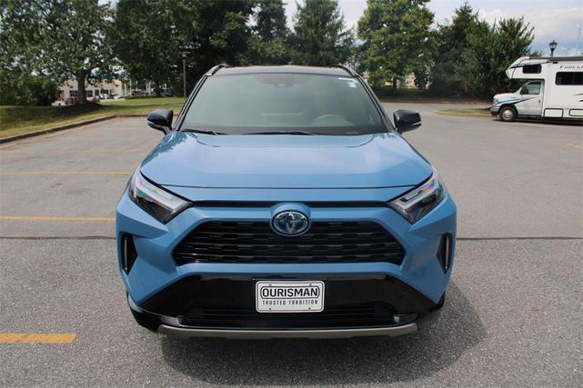 Photo of 2024 Cavalry Blue/Midnight Black Metallic Toyota RAV4 Hybrid