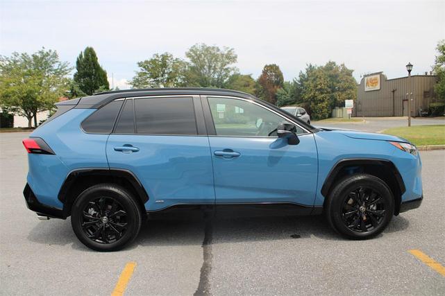 Photo of 2024 Cavalry Blue/Midnight Black Metallic Toyota RAV4 Hybrid
