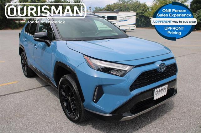 Photo of 2024 Cavalry Blue/Midnight Black Metallic Toyota RAV4 Hybrid