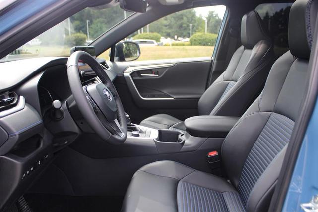 Photo of 2024 Cavalry Blue/Midnight Black Metallic Toyota RAV4 Hybrid