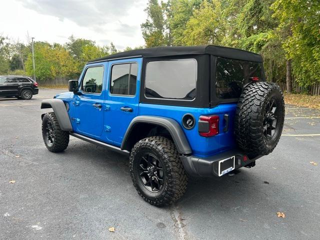 Photo of 2024 Hydro Blue Pearl Jeep Wrangler