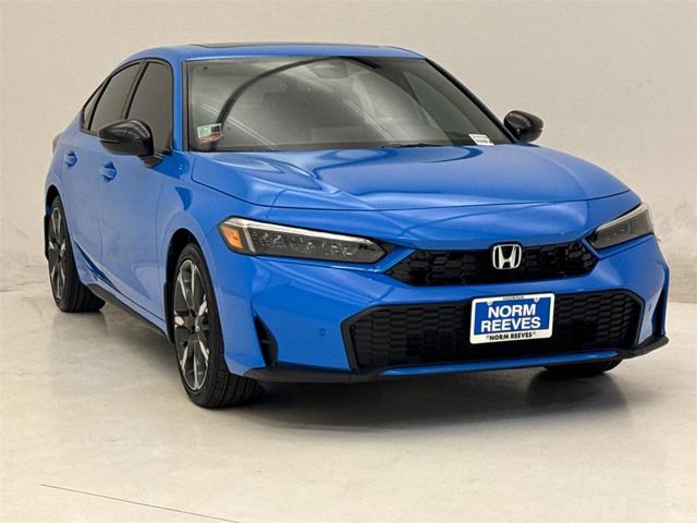 Photo of 2025 Boost Blue Pearl Honda Civic Hybrid