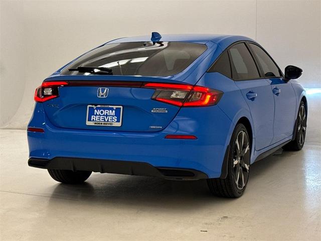 Photo of 2025 Boost Blue Pearl Honda Civic Hybrid