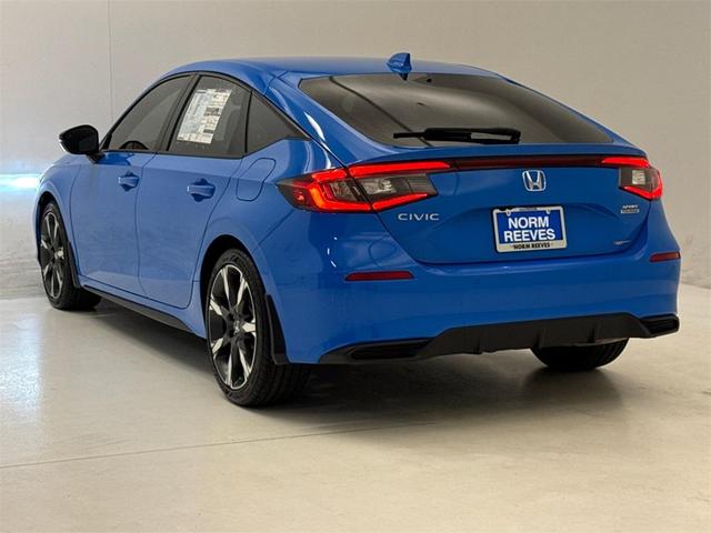 Photo of 2025 Boost Blue Pearl Honda Civic Hybrid