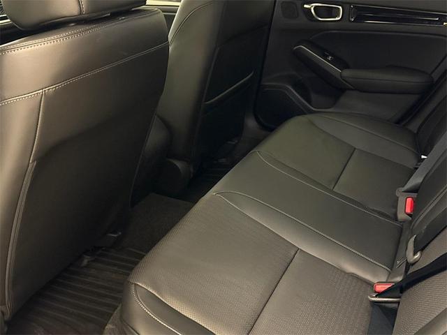 Photo of 2025 Boost Blue Pearl Honda Civic Hybrid