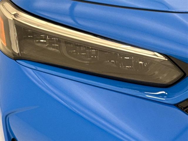Photo of 2025 Boost Blue Pearl Honda Civic Hybrid