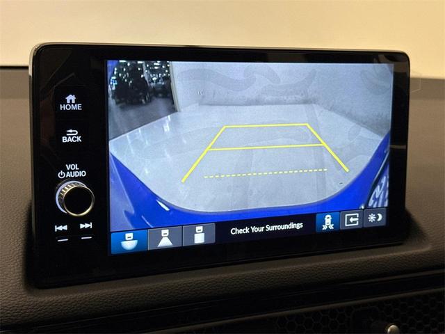Photo of 2025 Boost Blue Pearl Honda Civic Hybrid