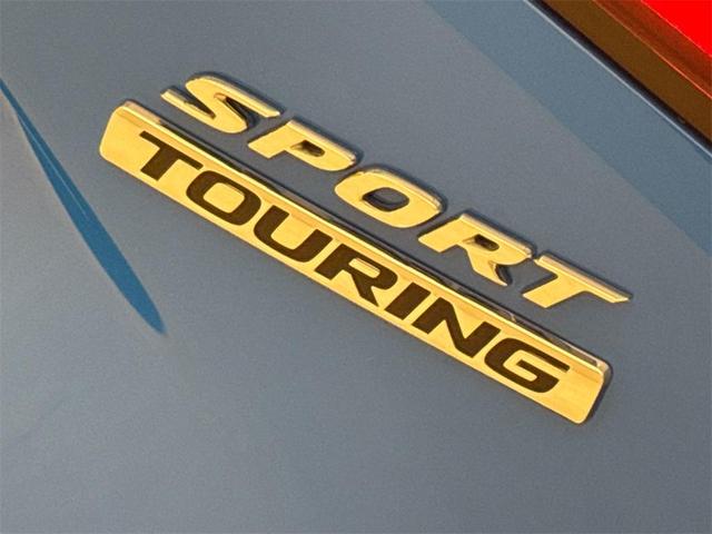Photo of 2025 Boost Blue Pearl Honda Civic Hybrid
