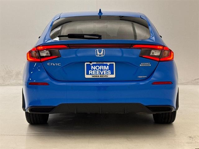 Photo of 2025 Boost Blue Pearl Honda Civic Hybrid