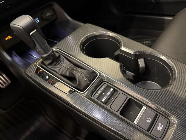 Photo of 2025 Boost Blue Pearl Honda Civic Hybrid