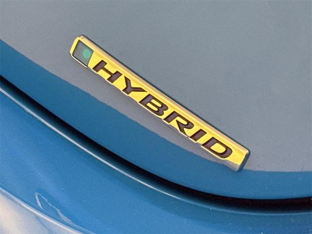 Photo of 2025 Boost Blue Pearl Honda Civic Hybrid