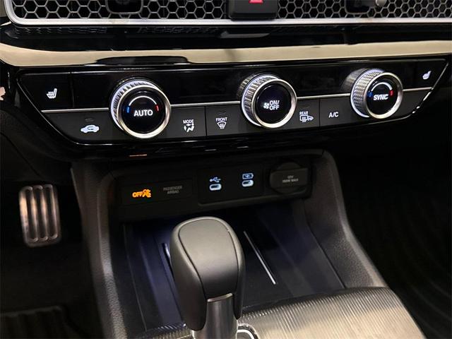 Photo of 2025 Boost Blue Pearl Honda Civic Hybrid