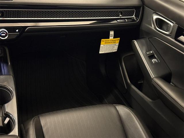 Photo of 2025 Solar Silver Metallic Honda Civic Hybrid