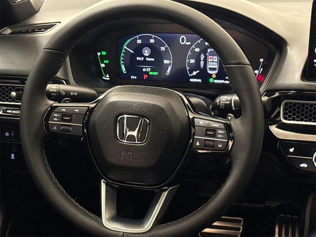 Photo of 2025 Solar Silver Metallic Honda Civic Hybrid