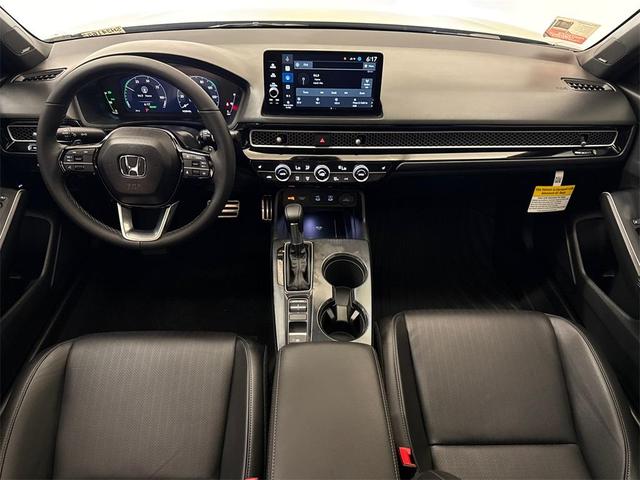 Photo of 2025 Solar Silver Metallic Honda Civic Hybrid